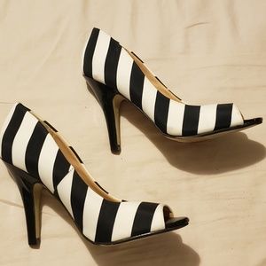 Black and white striped pumps